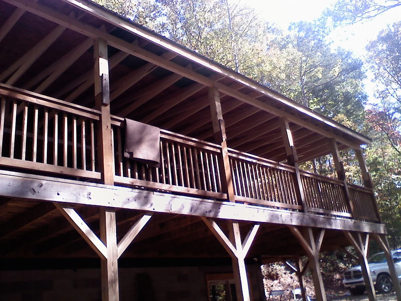 Timber framing under a new elevated porch and deck — Roof Leak Repair in Green Bay by Roofing Brothers